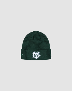 The LFDY x New Era Beanie by LIVE FAST DIE YOUNG is a dark green ribbed knit beanie with a white embroidered DY logo and symbols on the folded cuff, shown against a plain light gray background.