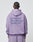 Seen from behind, a person with braided hair wears the LIVE FAST DIE YOUNG Basic 360 Hooded in Oversize Fit, lavender, with bold back text LiveFast HvySweat 360g/m² and smaller print below. Vintage-washed Baumwolle-Polyester blend.