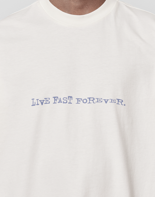 The LFDY We Walked Tee by LIVE FAST DIE YOUNG is a white, oversize-fit t-shirt made from 100% cotton, with "LIVE FAST FOREVER." in blue, slightly distorted text on the chest.