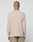 A person with a shaved head is facing away from the camera, wearing the LIVE FAST DIE YOUNG Basic Regular Rib Longsleeve in beige and light olive green shorts, set against a plain white background.