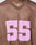 A person wears the LFDY Mesh Jersey by LIVE FAST DIE YOUNG: a brown, oversized mesh top with a V-neck, large pink 55 on the front, and LFDY lettering near the collar.