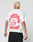 A person with short, bleached blonde hair wears the LFDY Hinterhof Tee by LIVE FAST DIE YOUNG, featuring large red LIVE FAST WINTERHOF text and two wrestlers on the back. The 100% cotton white shirt is shown from behind.