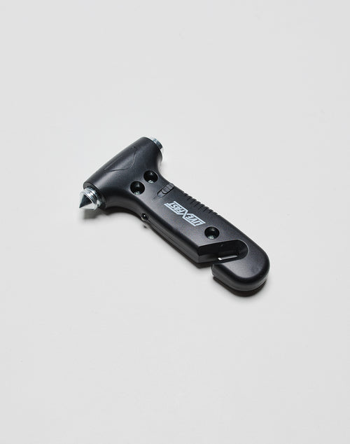 The LFDY Emergency Hammer by LIVE FAST DIE YOUNG is a black, one-size car safety tool with a pointed metal tip for breaking glass and a concealed seatbelt cutter. Subtle logo print. Displayed on a plain white background.