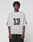 A man with short dreadlocks wears the LIVE FAST DIE YOUNG LFDY Mesh Jersey—an oversized, light gray polyester jersey with a V-neck and black number 13 on the front and sleeves—against a plain light background.