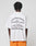 A person wears the LFDY Praying Tee by LIVE FAST DIE YOUNG, an oversized white cotton T-shirt with black front and back prints featuring “Live Fast Forever. 00-00-0000 00-00-0000 Fuck Die Young,” praying hands, a cross, and flower graphics.
