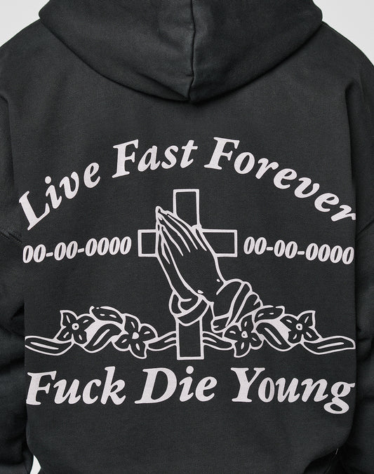 The LFDY Praying Hooded Zip by LIVE FAST DIE YOUNG is an oversize hoodie with a distressed effect, featuring Live Fast Forever and Fuck Die Young text, praying hands with a cross, floral details, and 00-00-0000 dates.