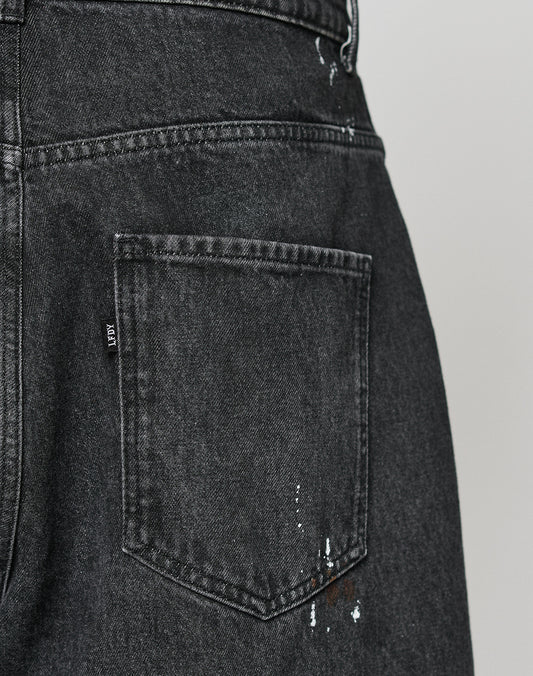 Close-up of the back pocket on LIVE FAST DIE YOUNGs LFDY Baggy Denim, featuring splashes of color near the bottom and showcasing their signature baggy fit style.