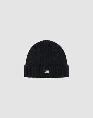 The Live Fast Boucle Beanie by LIVE FAST DIE YOUNG is a black polyester knit, one size, with a folded brim and a small white embroidered logo on the front, shown against a plain light gray background.