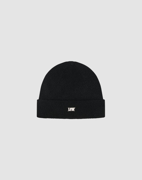 The Live Fast Boucle Beanie by LIVE FAST DIE YOUNG is a black polyester knit, one size, with a folded brim and a small white embroidered logo on the front, shown against a plain light gray background.