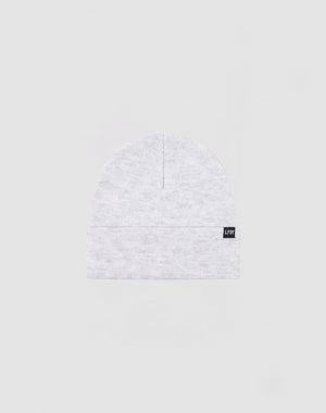 The LIVE FAST DIE YOUNG Basic Beanie is a light gray Polyacryl knit, one size, with a folded cuff and a small black rectangular flaglabel with white text on the cuff, shown against a plain light background.