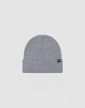 The LIVE FAST DIE YOUNG Basic Beanie (LF2310-14710) is a gray knit polyacryl hat with a folded brim and a small black rectangular tag on the cuff, shown against a plain light background. One Size.