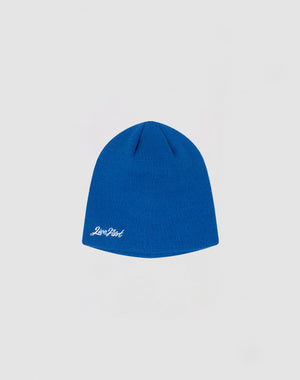 A blue Script Beanie by LIVE FAST DIE YOUNG features a small white Zero Dark logo-stitch on the lower edge, displayed against a light gray background.