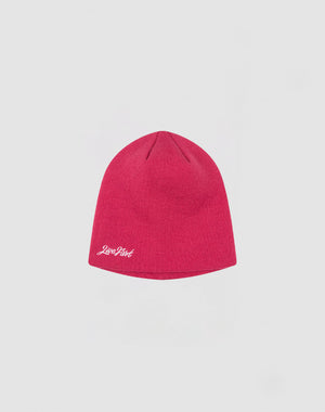The Script Beanie by LIVE FAST DIE YOUNG is a plain red polyacryl knit hat featuring a white Love Pink logo on the lower edge, showcased against a light gray backdrop.