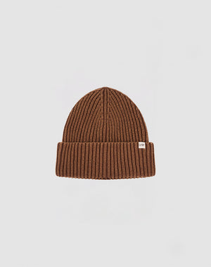 The LIVE FAST DIE YOUNG Washed Rib Knit Beanie in brown cotton features a folded cuff and a small white rectangular side tag, shown against a plain light gray background.