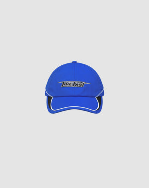 The Live Fast 3000 Cap by LIVE FAST DIE YOUNG is a blue polyester baseball cap with white trim and a silver and black IMPACT Logo-Stick on the front, shown against a plain light gray background.