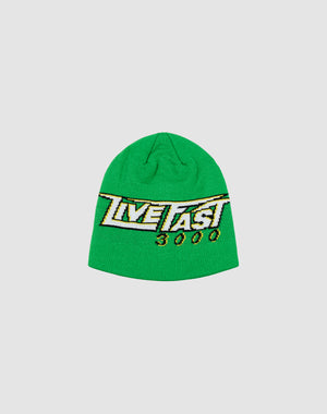 The Live Fast 3000 Beanie by LIVE FAST DIE YOUNG is a bright green polyacryl knit with a bold yellow, black, and white “LIVE FAST 3000” graphic on the front. Shown on a light gray background. One size fits all.
