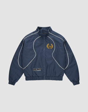 The LFDY Canvas Jacket by LIVE FAST DIE YOUNG is navy blue with white piping, multicolor embroidered logos including a yellow crest on the left chest, a LIVE FAST patch at the waistband, plus elastic cuffs and hem in a regular fit. | plain