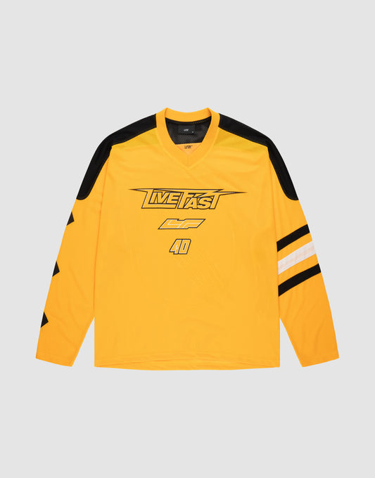 The LFDY Autobahn Jersey by LIVE FAST DIE YOUNG is a yellow 100% polyester long-sleeve jersey with black/white sleeve stripes, black shoulder accents, "LIVE FAST" graphics, and the number 40 on the chest. | plain