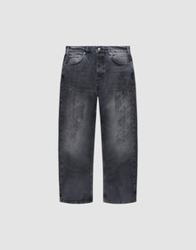 The LFDY Tire Tracks Denim by LIVE FAST DIE YOUNG are wide-leg black jeans with a baggy fit, faded distressed tire track pattern on the front, five pockets, button closure, 100% cotton, shown on a plain light gray background. | plain