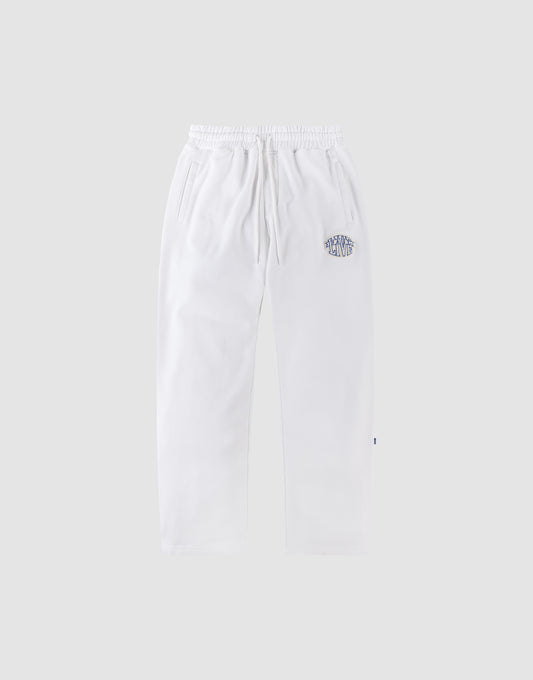 LFDY Radiator Sweatpants by LIVE FAST DIE YOUNG in white, with an elastic waistband and side pockets. Shown on a light gray background, featuring a blue and white chenille patch on the upper left thigh. | plain