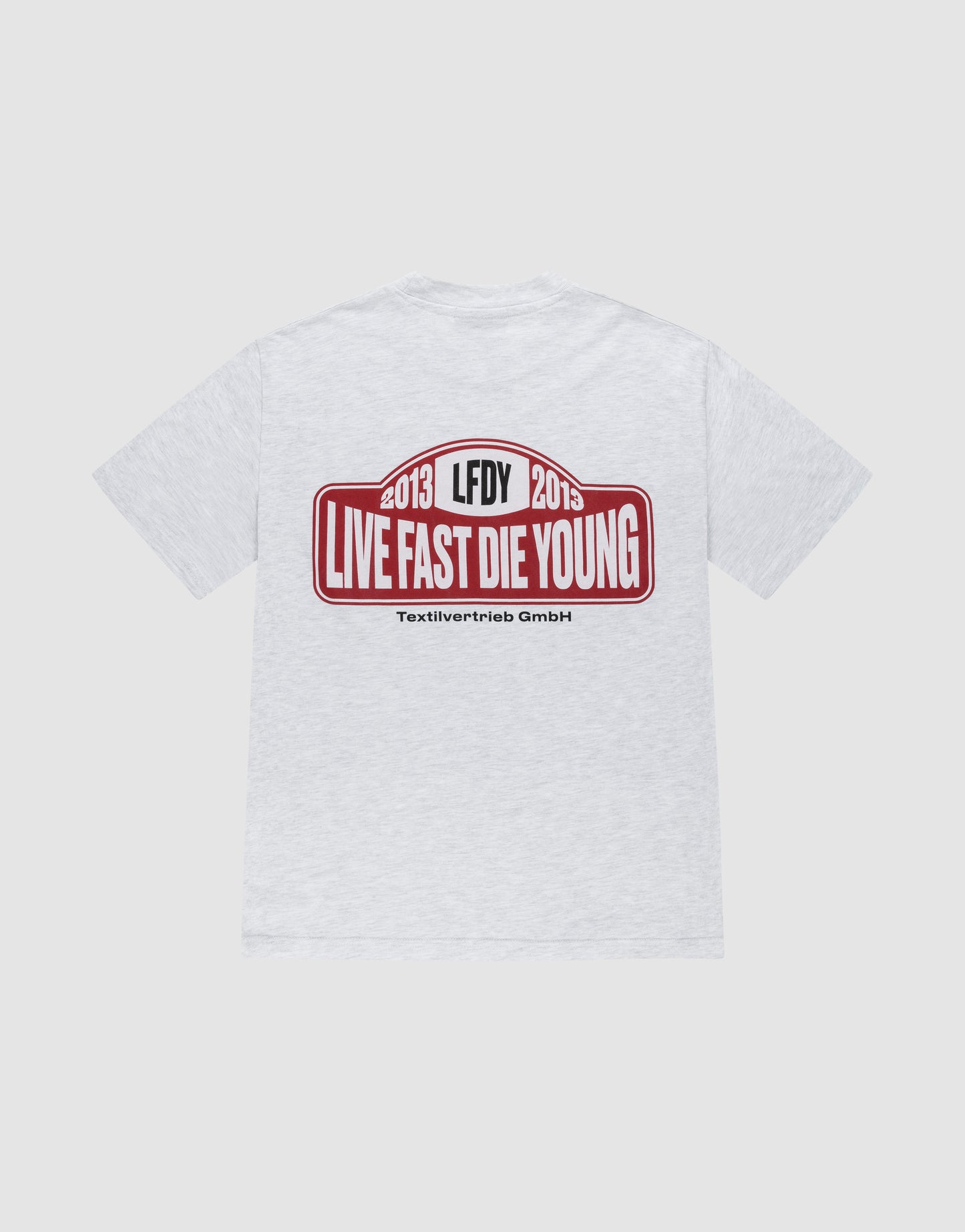 The Live Fast 2013 Tee by LIVE FAST DIE YOUNG is a light gray regular fit cotton t-shirt with a bold red and white backprint: “2013 LFDY 2013 LIVE FAST DIE YOUNG” above smaller Textilvertieb GmbH text.
