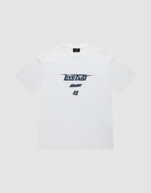 The LFDY Triple Racing Tee by LIVE FAST DIE YOUNG is a white shirt with black and gray multilogo front print—LIVE FAST in bold, AD below—crafted from 100% Baumwolle and shown against a light gray background. | plain