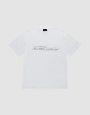 The LFDY Europe Run Tee by LIVE FAST DIE YOUNG is a plain white, short-sleeve t-shirt made of 100% Baumwolle, featuring "LIVE FAST BREAK IT SLOW" in gray blocky letters across the chest on a light gray background. | plain