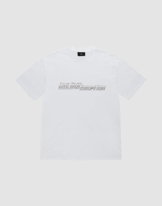 The LFDY Europe Run Tee by LIVE FAST DIE YOUNG is a plain white, short-sleeve t-shirt made of 100% Baumwolle, featuring "LIVE FAST BREAK IT SLOW" in gray blocky letters across the chest on a light gray background. | plain