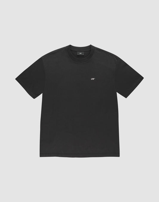 The LFDY Monaco Boys Tee by LIVE FAST DIE YOUNG is an oversize fit, short-sleeve black t-shirt with a small white LIFT logo on the left chest, made from 100% Baumwolle, shown on a light gray background.