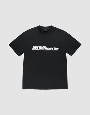 The LIVE FAST DIE YOUNG LFDY Europe Run Tee is a black, 100% Baumwolle oversize fit t-shirt with bold white "LIVE FAST THEN BAROQUE RUN" text across the chest, shown on a plain light gray background. | plain