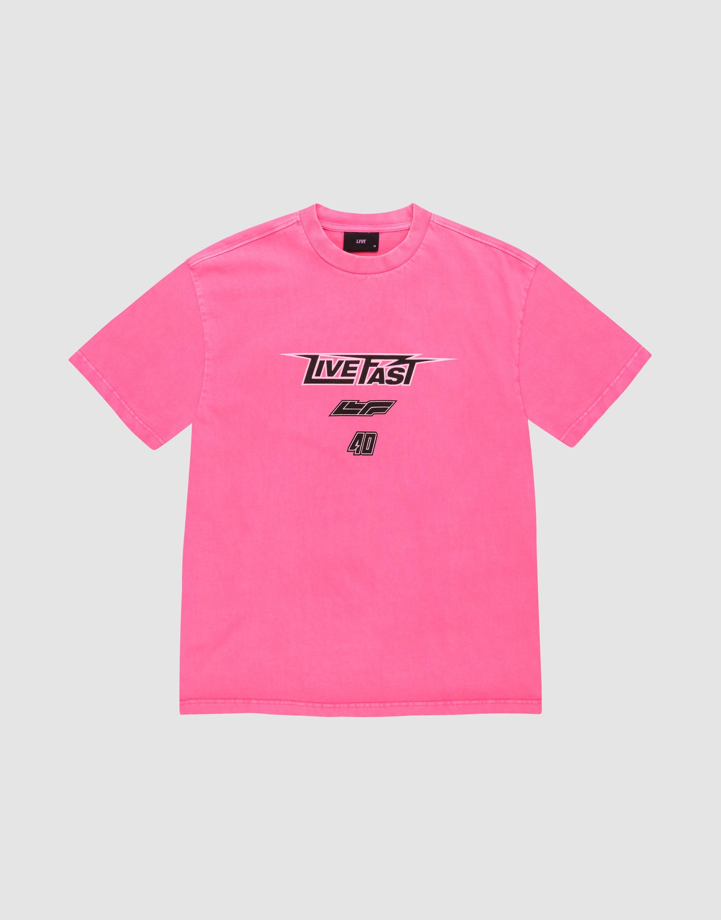 The LFDY Triple Racing Tee by LIVE FAST DIE YOUNG is a bright pink, 100% cotton oversize fit with black and white multi-logo front graphics featuring "LIVE FAST" above "LIF" and the number 40 on a light gray background.