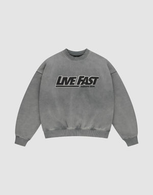 The LIVE FAST DIE YOUNG Live Fast Europe Run Sweater is a gray oversized crewneck with bold black and white "LIVE FAST" and "EUROPE RUN" text, ribbed cuffs/hem, vintage wash, and crafted from Baumwolle for a relaxed look. | plain