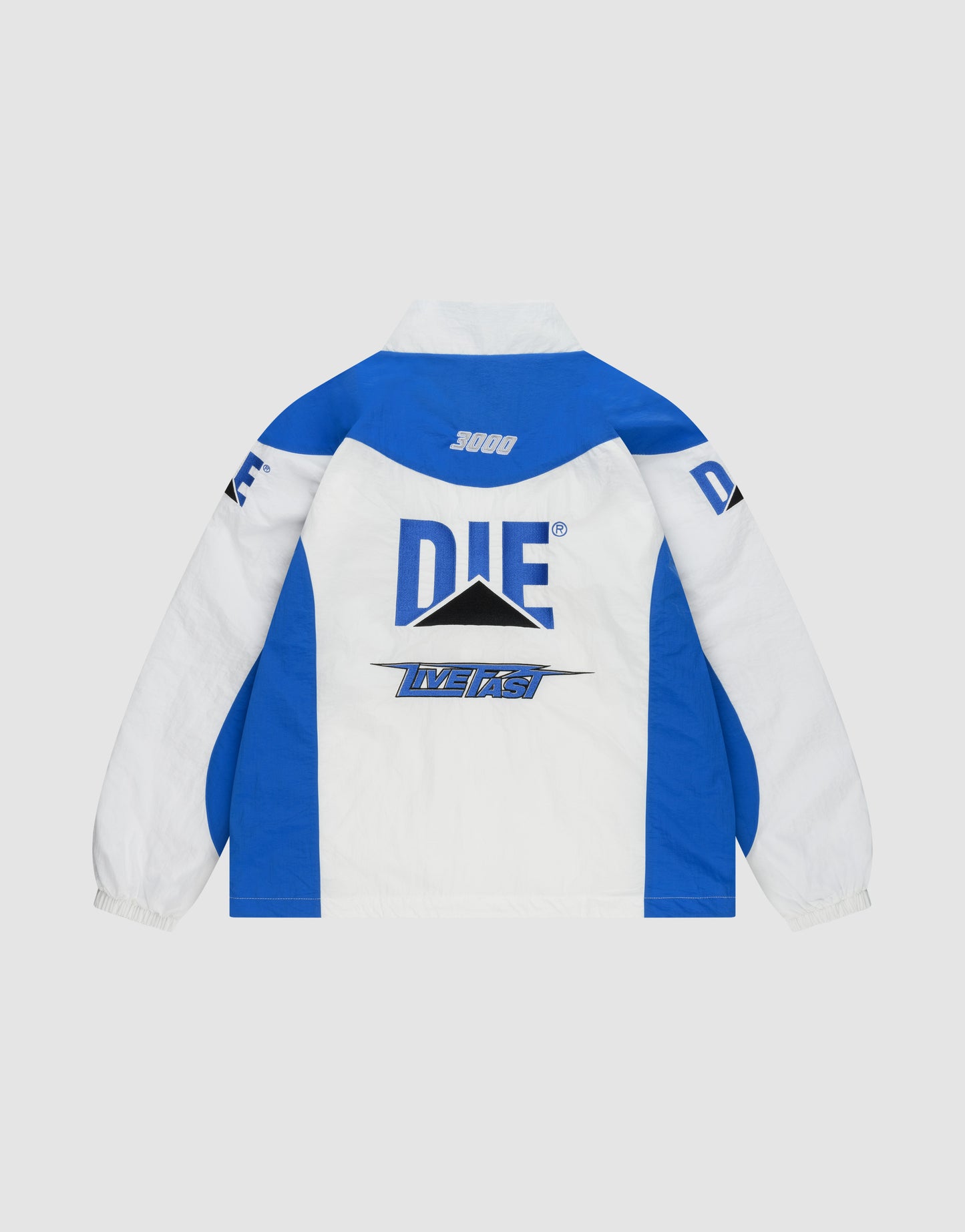 The LFDY Trackjacket 3000 by LIVE FAST DIE YOUNG features bold DIE lettering, a triangle graphic, multilogo embroidery, INVERS detail, 3000 on the collar, sleeve prints, elastic cuffs, and color-blocked panels in regular fit. White and blue design.