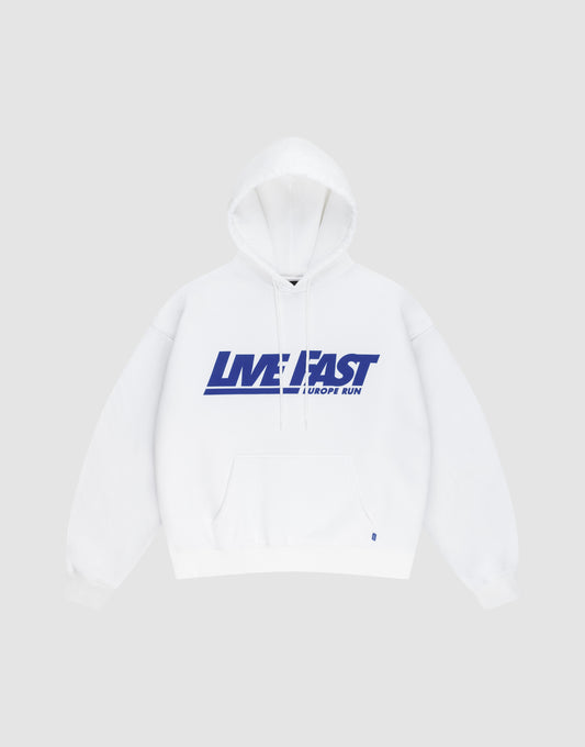 The Live Fast Europe Run Hooded by LIVE FAST DIE YOUNG is a light grey oversized hoodie with a front pocket, hood, and bold blue "LIVE FAST EUROPE RUN" print across the chest. | plain