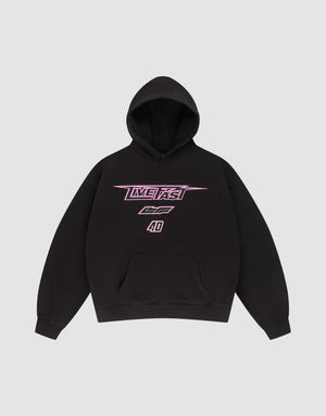 The LFDY Triple Racing Hooded by LIVE FAST DIE YOUNG is an oversized black hoodie with a front pocket, pink and white "LIVE FAST" text, stylized CC, and the number 40 in Silikon Druck, shown flat on a light gray background. | plain