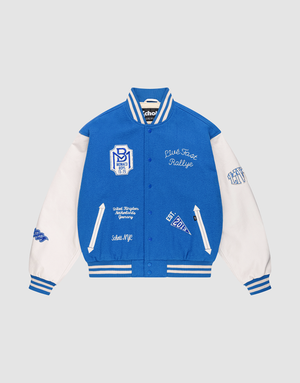 The LFDY x Schott NYC Varsity Jacket by LIVE FAST DIE YOUNG is a limited edition blue jacket with white leather sleeves, striped trims, and white embroidered patches and text on the chest, sleeves, and front. | plain
