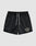 The LFDY Retro Satin Shorts by LIVE FAST DIE YOUNG feature a black design with white drawstrings, elastic waist, side pockets, and a white chainstitch "Live Fast Rallye" logo on the lower left leg, shown against a plain gray background.