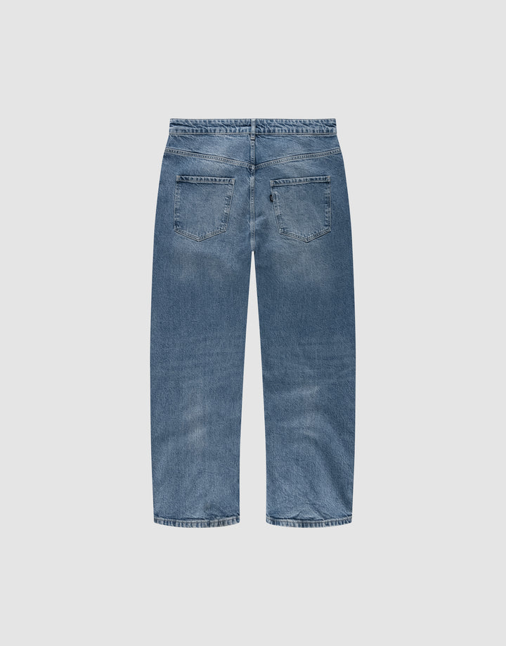 Back view of the LFDY Tire Tracks Denim by LIVE FAST DIE YOUNG in blue, featuring a baggy fit, straight leg, two back pockets, subtle fading on seat and thighs. Crafted from 100% cotton and displayed on a plain white background.