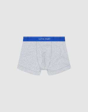 LIVE FAST DIE YOUNG Live Fast Trunks (2 Pack): Light grey mens Regular Fit boxer briefs in soft cotton, blue elastic waistband with LIVE FAST in white, shown on a plain white background.
