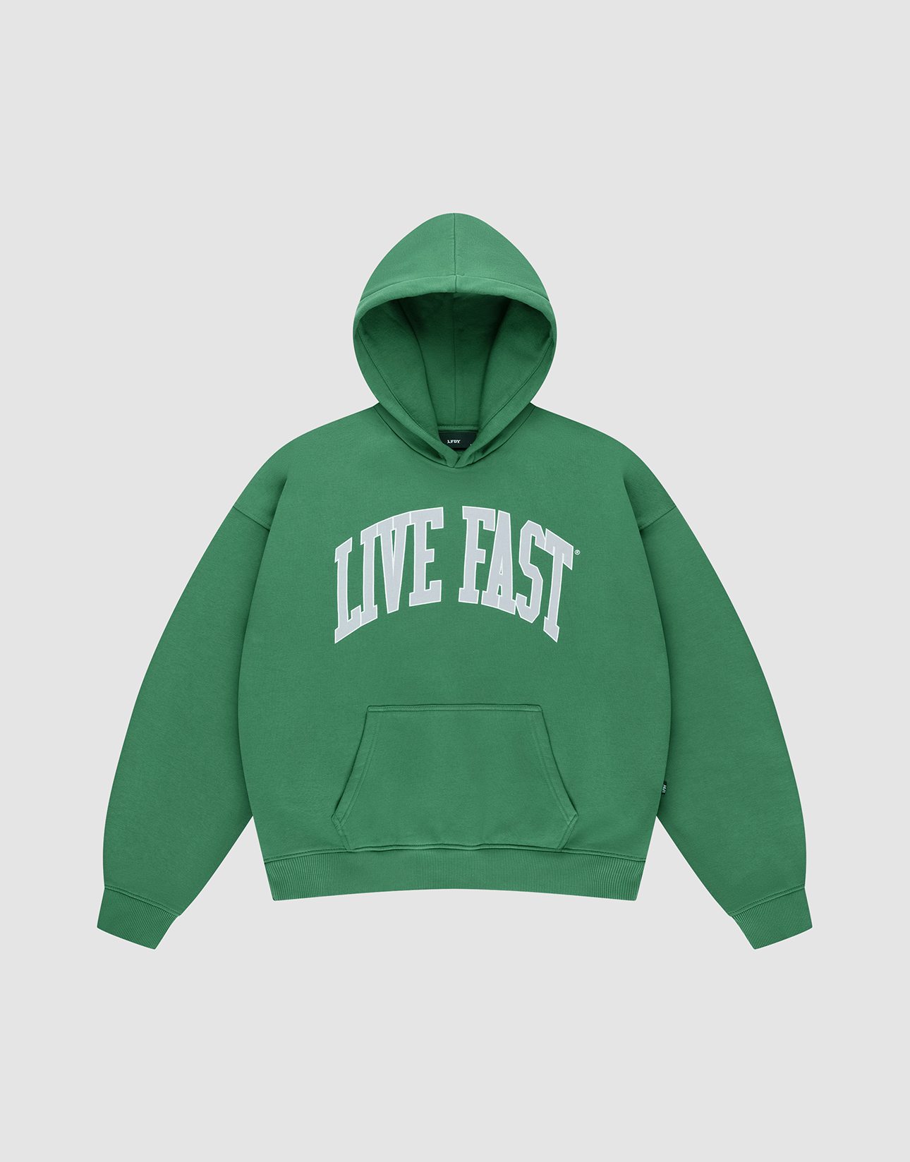 The Live Fast College Hooded by LIVE FAST DIE YOUNG is an oversize green hoodie with a white "LIVE FAST" front print, front pocket, shown on a plain light gray background.