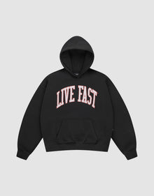The Live Fast College Hooded by LIVE FAST DIE YOUNG is a black, oversized hoodie with a front pocket and striking pink and white LIVE FAST print on the chest, crafted from comfortable Baumwolle. | plain