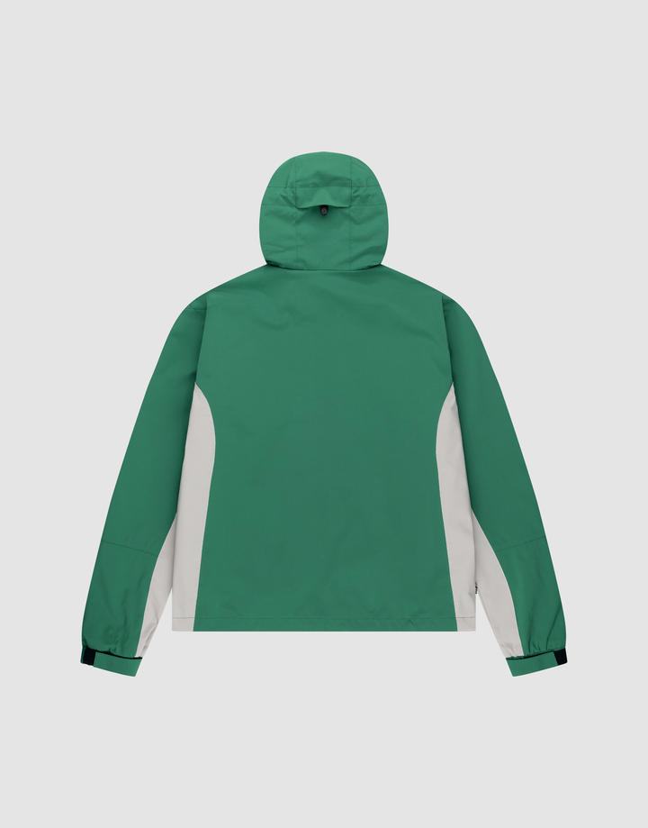 The LIVE FAST DIE YOUNG Basic Shell Jacket is a green hooded jacket with white side panels, black wrist tabs, and reflektierender Druck, shown from the back on a plain white background.