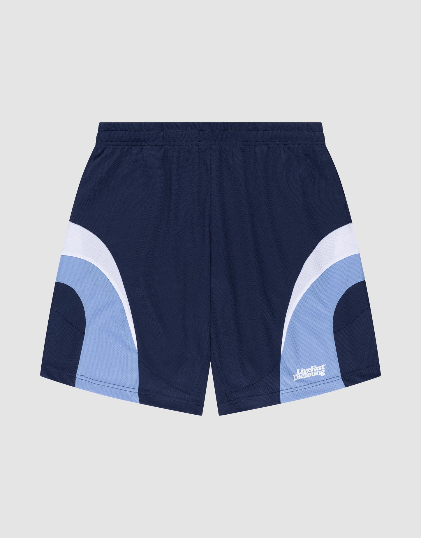 LIVE FAST DIE YOUNG Basic Trackshorts in navy blue with light blue and white curved side stripes, elastic waistband, and white Instant Design logo-print near the left hem, displayed flat on a light gray background.