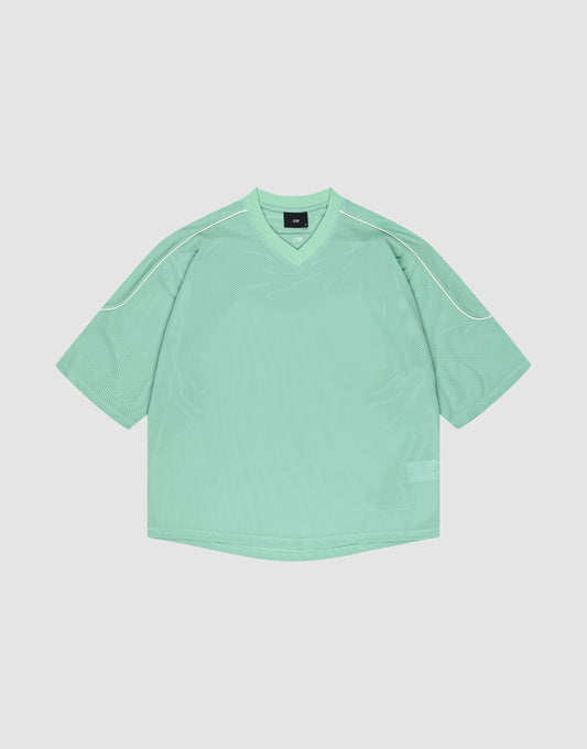 The LIVE FAST DIE YOUNG Basic Mesh Jersey is a loose-fitting mint green short-sleeve shirt with a V-neck and white piping on the shoulders, crafted from soft polyester and shown laid flat on a light background. | plain
