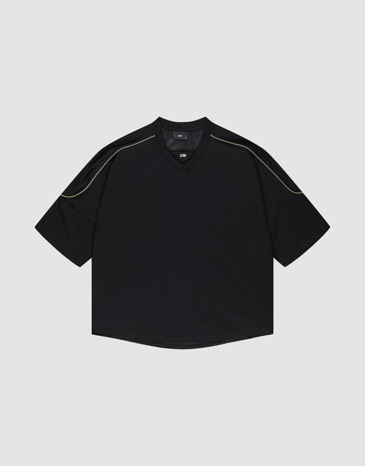 The LIVE FAST DIE YOUNG Basic Mesh Jersey is a black, short-sleeve, oversize-fit shirt with subtle contrast shoulder stitching, shown against a plain light gray background. | plain