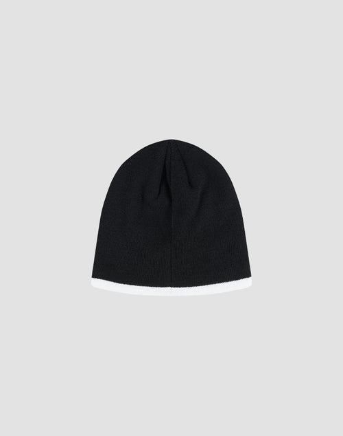 The DY Stripe Beanie by LIVE FAST DIE YOUNG is a black polyester knit hat with a white trim along the bottom, shown on a plain light gray background.