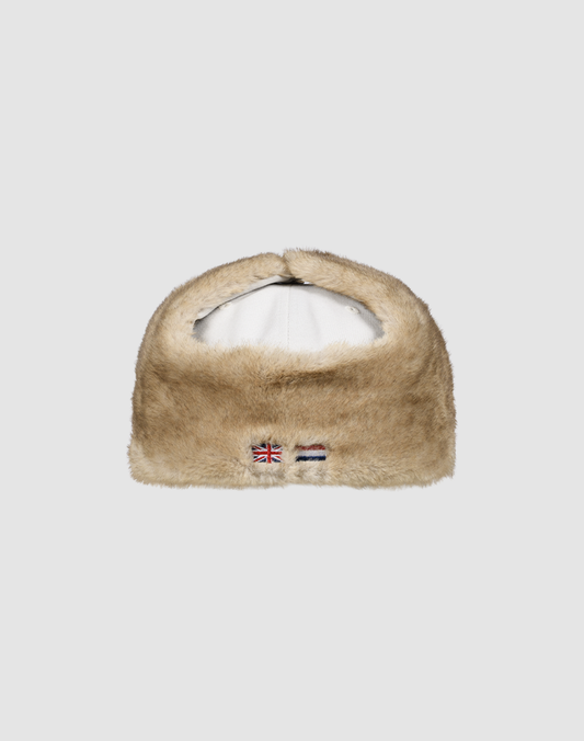 A beige LFDY x New Era 59Fifty DogEar Fitted Cap by LIVE FAST DIE YOUNG, with a white lining and small embroidered UK and Russian flags on the front, displayed on a plain light gray background.