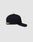 The LFDY Snapback by LIVE FAST DIE YOUNG is shown in side view against a plain light gray background, featuring a curved brim with green underside and a yellow patch with black text near the adjustable snap closure.