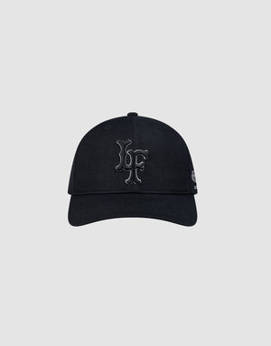 The LFDY Snapback by LIVE FAST DIE YOUNG is a black cap with a curved brim and grey underside, featuring large raised black LF initials on the front, a small white Multi-Logo-Stick on the left, and a practical snap closure.