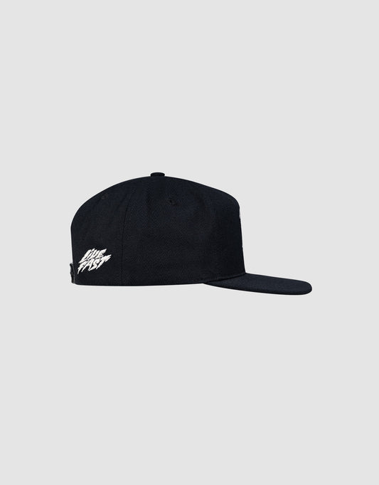 A black LF Rhinestone Cap by LIVE FAST DIE YOUNG, featuring a white embroidered logo on the side and a flat brim, shown in profile against a light gray background.